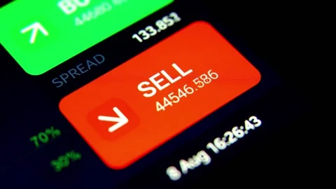 Hand pressing SELL button in online crypto currency or stock trading broker  스톡 동영상 158739008
