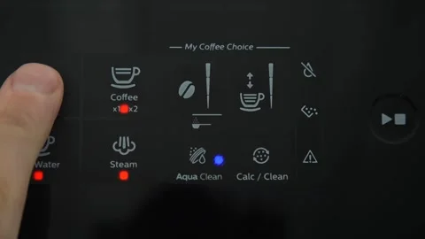 Hand pressing the touch button on a coffee machine. Coffee preparation Stock Footage 278819972