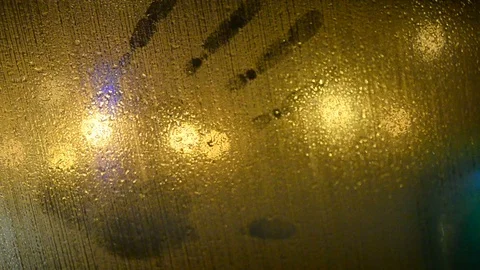 Hand print on a side window of a car Stock Footage 102253704