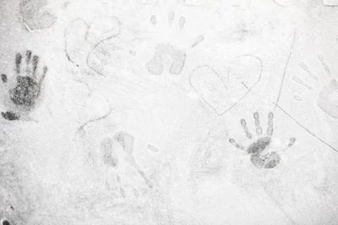 Hand prints in flour on dark background Stock Photos