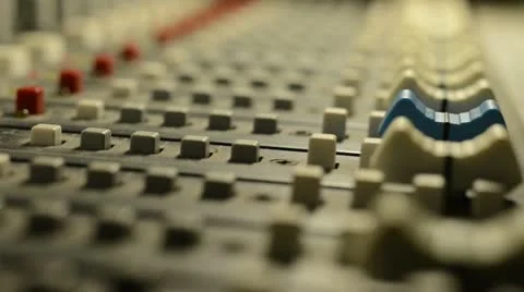 Hand on professional audio mixer. Sharp near of hand, a little DOF. Stock Footage 22007863