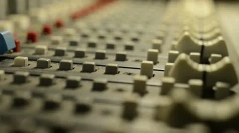 Hand on professional audio mixer. Sharp near of hand, a little DOF. Stock Footage 22007917