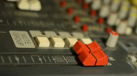 Hand on professional audio mixer. Sharp near of hand, a little DOF. Stock Footage 22007921