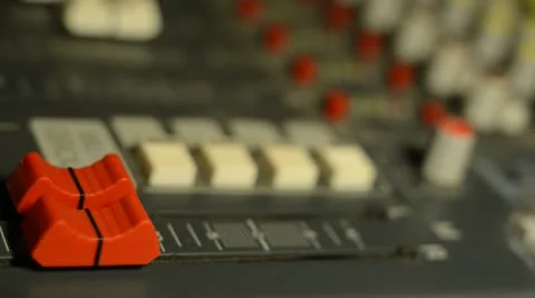 Hand on professional audio mixer. Sharp near of hand, a little DOF. Stock Footage 22007925