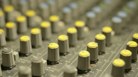 Hand on professional audio mixer. Sharp near of hand, a little DOF. Stock Footage 22007993