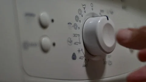 Hand Programing The Washing Machine, Button Detail Vídeos de archivo 70164402