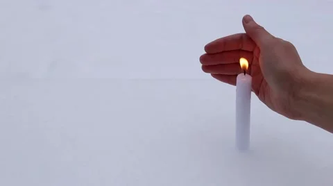 Hand protecting candle fire 스톡 동영상 60908328