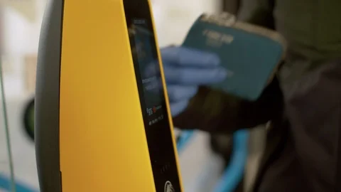 Hand in protective gloves paying in the bus Stock Footage 126867568