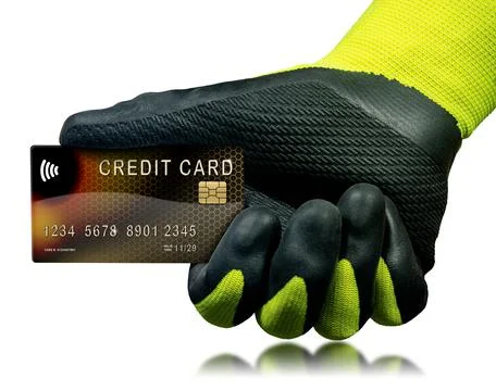 Hand with Protective Work Gloves Holding a Credit Card Stock Photos