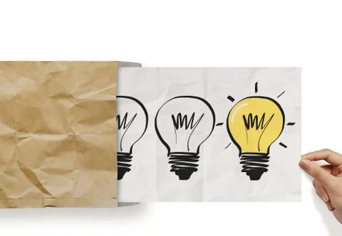 Hand pull crumpled paper show light bulb out of recycle envelope as concept Stock Illustration