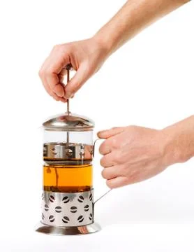 Hand pull french press for making tea isolated Stock Photos
