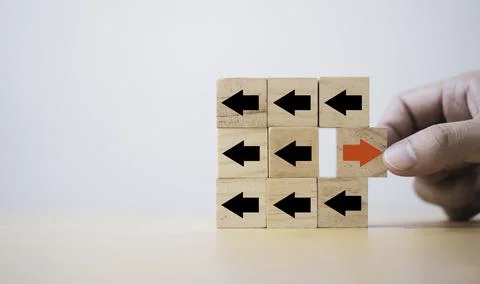 Hand pull out red arrow red arrow which print screen on wooden cube block a.. Stock Photos