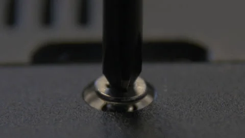 A hand-pulled craftsman tightens a screw with a screwdriver. Stock-Footage 170794267