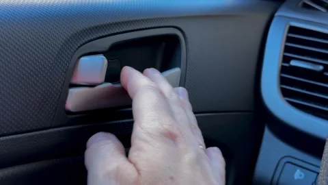 Hand-pulling-car-door-handle-interior Stock Footage 341401576