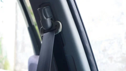 Hand pulling car seat belt Stock-Footage 334699345