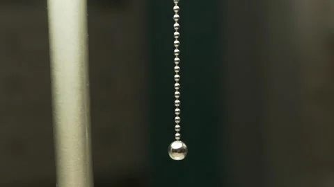 Hand Pulling Cord String from Lamp, Macro. Woman Turns Off Lamp Light in Cozy Ro 스톡 동영상 170291860