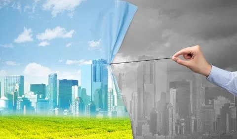 Hand pulling green cityscape curtain to gray cityscape 스톡 사진
