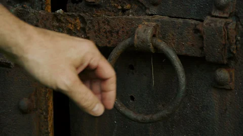 Hand Pulling Iron Ring Stock Footage 27562071