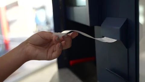 Hand Pulling a Printed Receipt from a Receipt Printer Stock-Footage 342662244