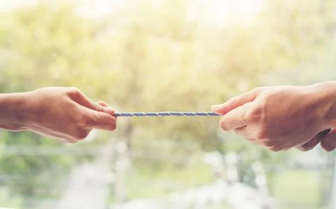Hand pulling rope for show power of group concept Stock-Fotos