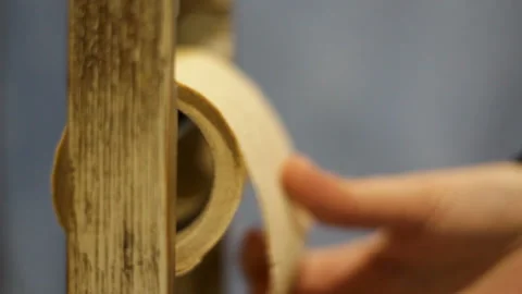 Hand pulling toilet paper Stock Footage 103424537