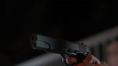 Hand pulling trigger of gun while practicing a shoot Vídeos de archivo 67555526