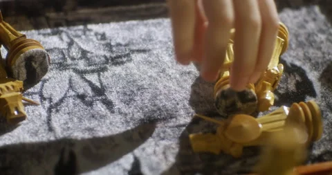 The hand pulling the wooden handcrafted chess pieces out of the chess board. Stock Footage 149318557
