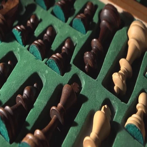Hand pulls chess pieces out of the case Stock Footage 69542278