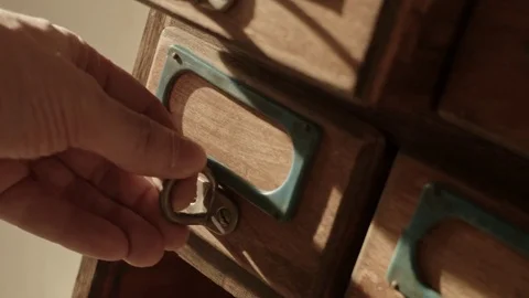 Hand pulls old wooden Drawer sliding Stock Footage 74055240