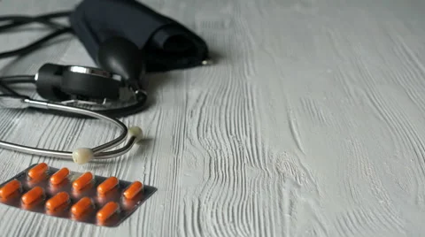 Hand pulls out the pills from a blister card Stock Footage 62767073