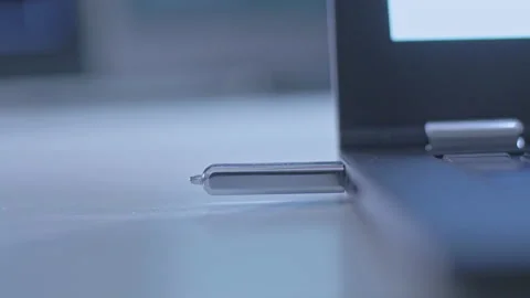 Hand pulls out USB flash drive from a laptop computer Video stock 143003143