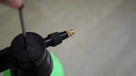 Hand Pump Sprayer Close Up Pressurizing Plant Care Garden Treatment Weeds Stock Footage 321810867