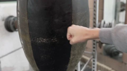 Hand punching tear drop heavy bag POV Stock Footage 163768969