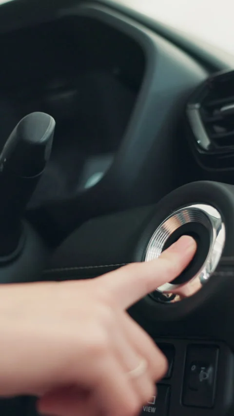 Hand, push button and start car for travel, journey and self driving with Stock Footage 309811124