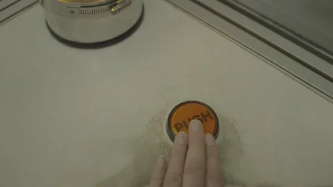 Hand pushes orange button 스톡 동영상 219351741