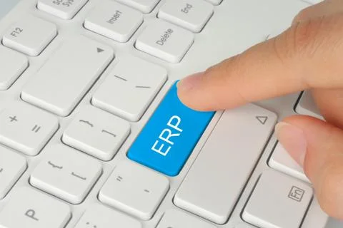 Hand pushing blue erp  button on white keyboard background . Stock Photos