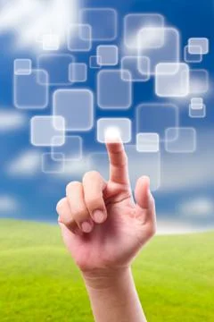 Hand pushing button on blue sky Stock Photos