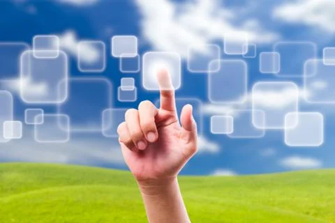 Hand pushing button on blue sky Stock Photos