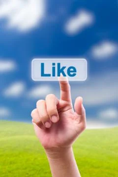 Hand pushing like button Stock Photos