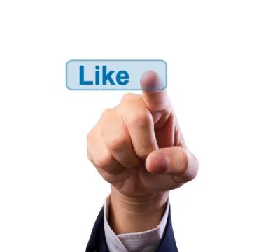Hand pushing like button Stock Photos