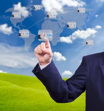 Hand pushing like button Stock Photos