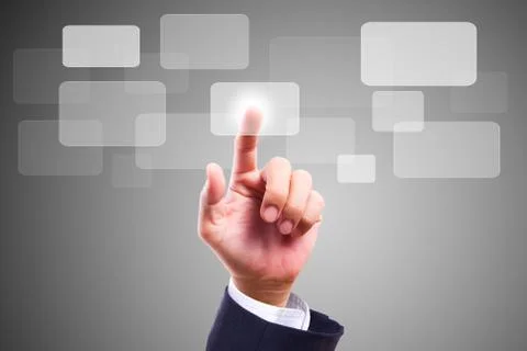 Hand pushing button on screen Stock Photos