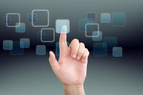 Hand pushing a button on a touch screen interface Stock Photos