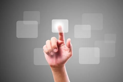 Hand pushing button on touch screen Stock Photos