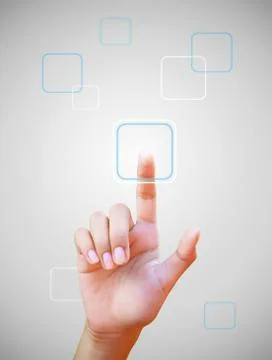 Hand pushing a button on a touch screen Stock Photos