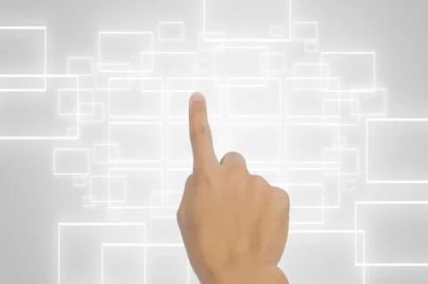 Hand pushing a button on a touch screen interface Fotos Stock