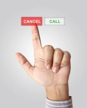 Hand pushing cancel button on touch screen Stock Photos