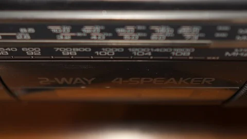 Hand pushing the eject button and taking a tape from silver videorecorder Stock Footage 111441314