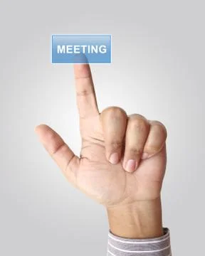 Hand pushing meeting button on touch screen Stock Photos