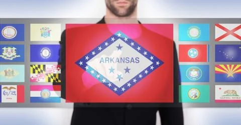 Hand pushing on a touch screen interface Illustrazione stock